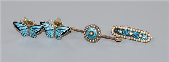 A pair of Norwegian 925 and enamel butterfly ear clips and two yellow metal and seed pearl set brooches.